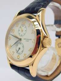 Patek Philippe Travel Time 5134J in Gelbgold Image 9