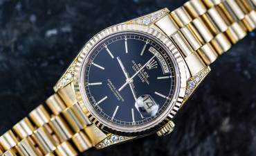 pre owned ROLEX DAY DATE Chronometer "Diamond Lugs" in 18k Yellowgold